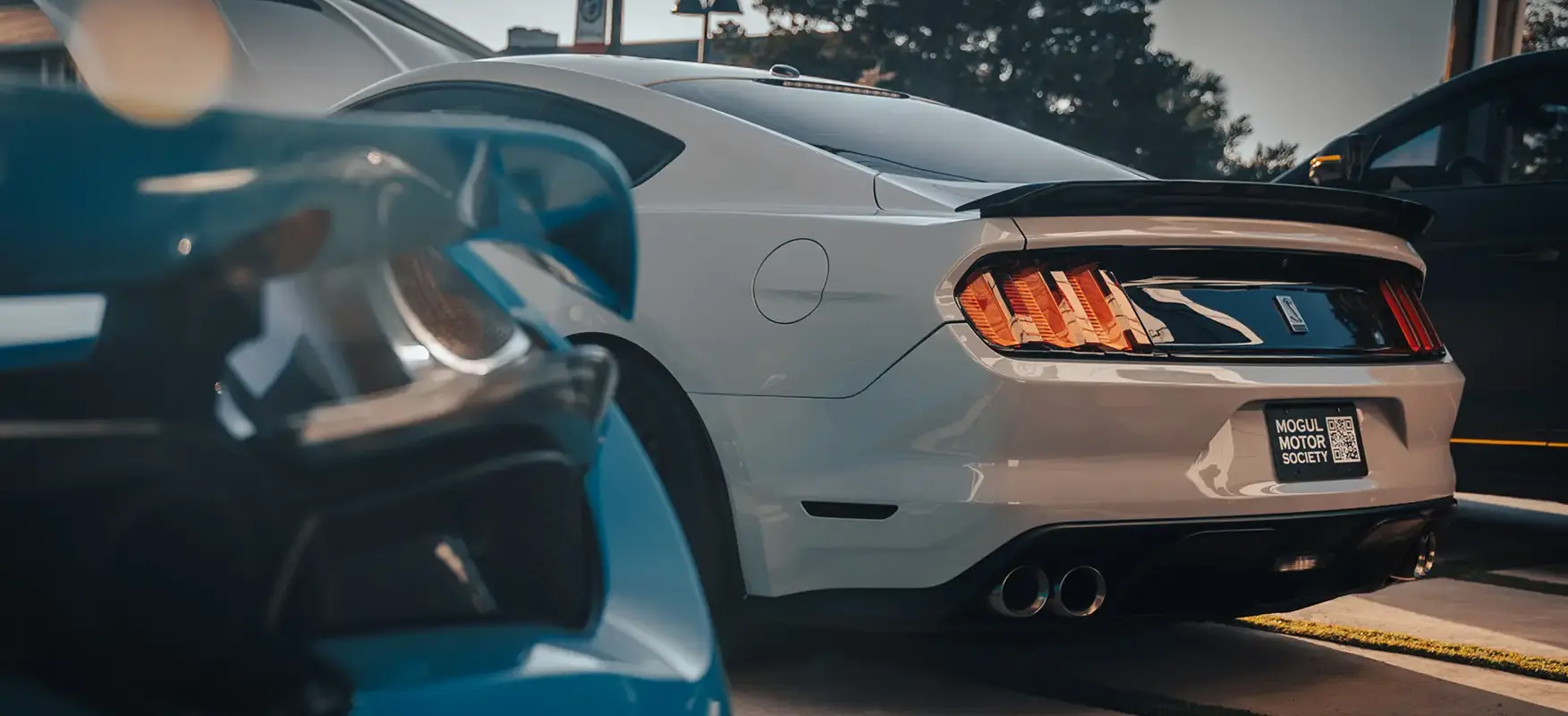 Mustang alongside other cars
